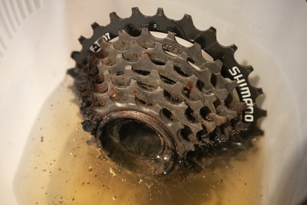 Leave rusty bike parts to submerge in vinegar
